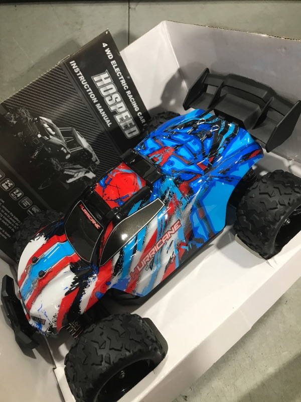 Photo 2 of 4WD High-Speed Remote Control Truck 1:18 Full Scale 2.4G All-Terrain RC Off-Road Vehicle/Independent Shock Absorber Children RC Toy Cars with Two Rechargeable Batteries