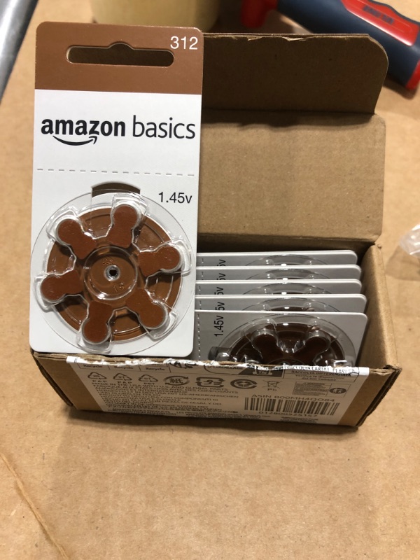 Photo 2 of Amazon Basics 60-Pack Hearing Aid Size 312 Zinc-Air Batteries, 1.45 Volt, Brown Tab, 4-Year Shelf Life