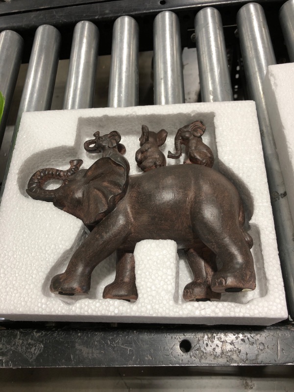 Photo 2 of Nature's Mark 8" H 3 Baby Elephants Riding an Elephant Resin Statue Figurine Home Decorative Accent Decor (Brown)