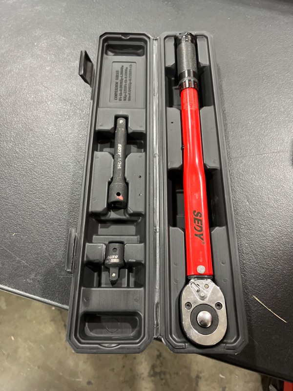 Photo 2 of 1/2-inch Drive Click Torque Wrench 1/2 Drive - Precision 10-150 ft.lb/13.6-203.5Nm Range, Ratcheting Head with Secure Locking Mechanism, Adapter & Extension 1/2" Drive