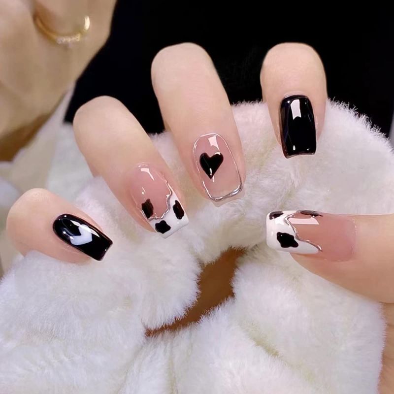 Photo 1 of Heart Press on Nails Medium Square Fakes Nails Cute Black White Cow Pattern Line Design Valentine False Nails Acrylic Nails for Women and Girls Static Stick on Nails Reusable Full Cover 24 PCS
