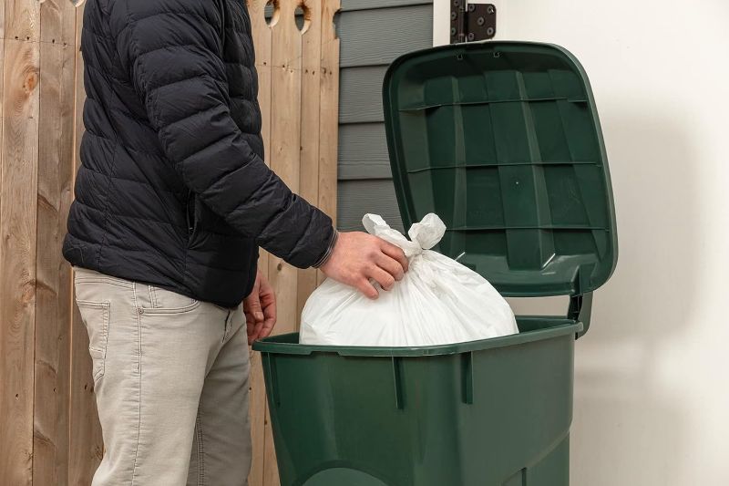 Photo 1 of ECOSolution 32 Gallon Wheeled Outdoor Garbage Can with Attached Snap Lock Lid and Heavy-Duty Handles, ECO Green, Heavy-Duty Construction, Perfect Back Yard, Deck, or Garage Trash Can