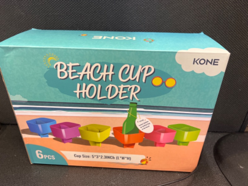 Photo 2 of Kone Beach Cup Holder, Beach Essentials Accessories for Vacation Must Haves for Family and Friends, Multifunctional Sand Drink Holders for Phone, Sunglass, Beverage and Key Storage, Set of 6 6 Pack