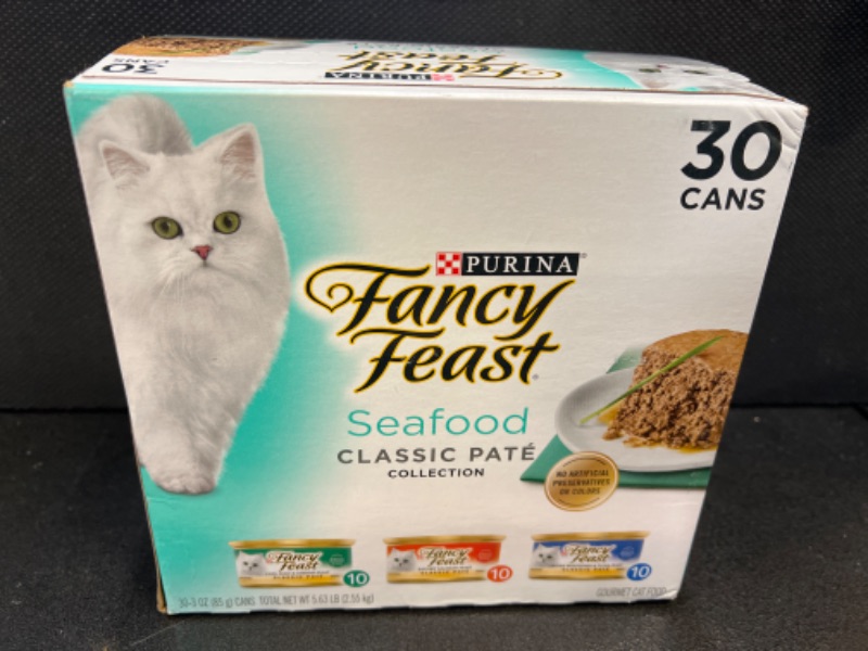 Photo 2 of --EXP   07-2025        `Purina Fancy Feast Grain Free Pate Wet Cat Food Variety Pack, Seafood Classic Pate Collection - 3 oz. Cans, 3 -Ounce (Pack of 30)EXP       