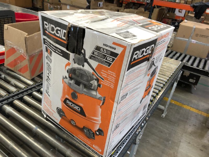 Photo 4 of RIDGID 16 Gallon 6.5 Peak HP NXT Wet/Dry Shop Vacuum with Detachable Blower, Filter, Locking Hose and Accessories, Oranges/Peaches
