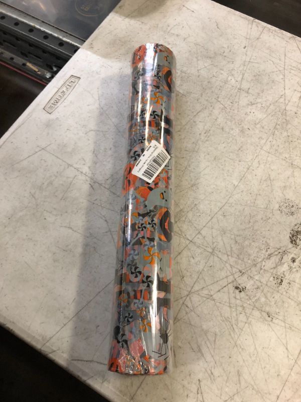 Photo 2 of 100 Ft X 32 in Halloween Cellophane Wrap Roll 2.3 Mil Thick Halloween Cellophane Bags Crystal Clear with Special Pumpkin Ghost Spider Wrap Cellophane for Halloween Wrapping Gifts