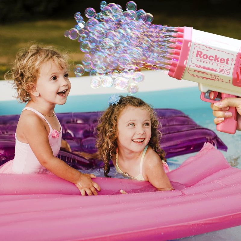 Photo 1 of 69 Holes Rocket Bubble Gun, Bubble Machine Gun Toy with 6 Bottles Bubble Solution, Big Bubbles Guns Toys for Kids Adults Wedding Party Christmas Birthday Present Idea Gift (Pink)
