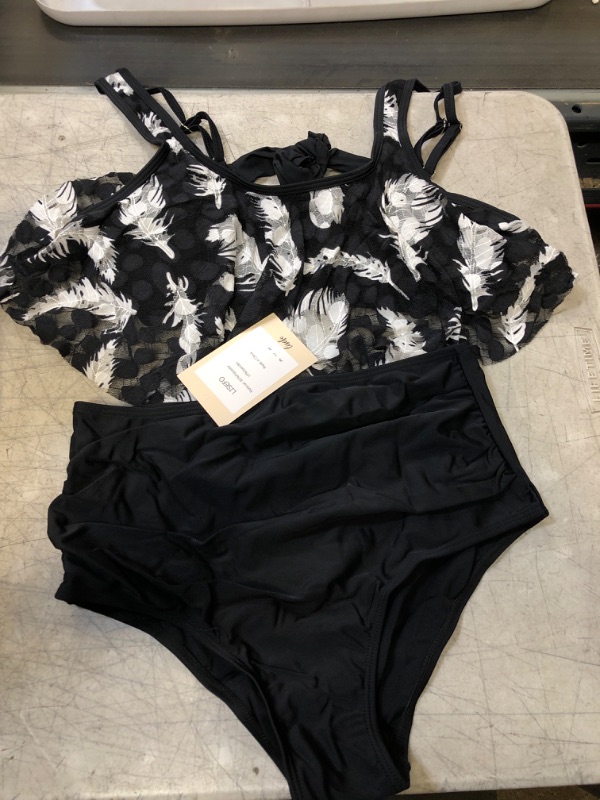 Photo 1 of WOMEN'S TWO PIECE SWIMSUIT SET
SIZE LARGE 