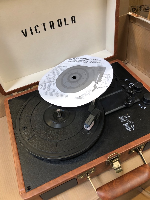 Photo 2 of Victrola Vintage 3-Speed Bluetooth Portable Suitcase Record Player with Built-in Speakers | Upgraded Turntable Audio Sound| Includes Extra Stylus | Brown Brown Record Player