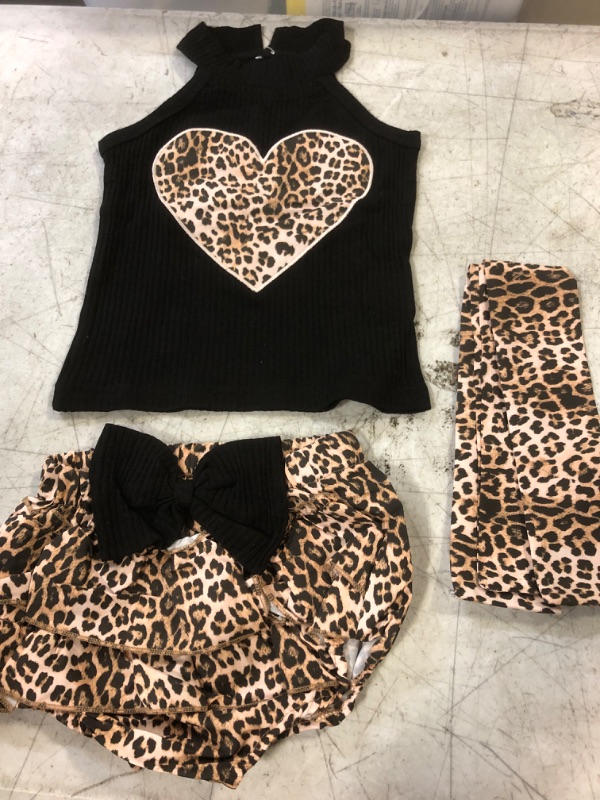 Photo 1 of BABY OUTFIT CHEETAH  PRINT SIZE 12-18M