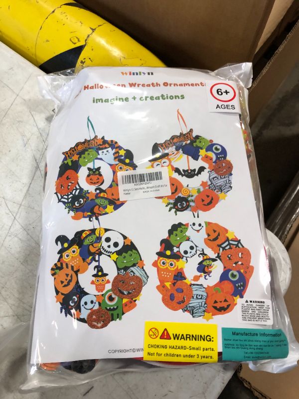 Photo 2 of Winlyn 12 Sets Halloween Wreath Decorations Foam Halloween Wreath Signs Craft Kits Pumpkins Jack-O`-Lantern Owl Ghost Witch Bats Monster Stickers for Kids Art Gift Favors Trick-Or-Treaters Front Door