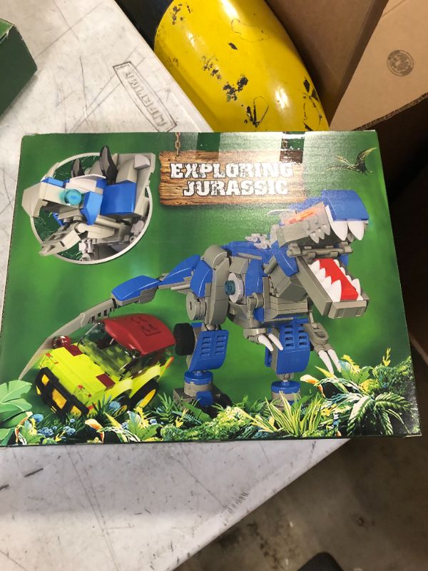 Photo 1 of Dinosaur Building Set, 2-in-1 Jurassic Dinosaur Building Kit for Kids, Form Triceratops, T-Rex and Explorer Tour Car Building Set,Christmas Toys Gifts for Kids (440Pcs)
