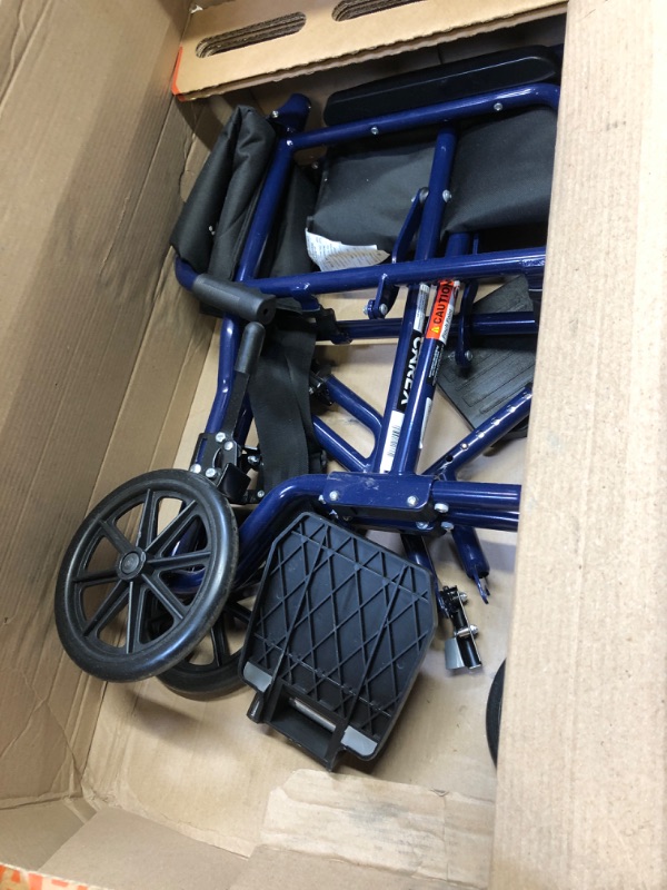 Photo 2 of Carex Transport Wheelchair With 19 inch Seat - Folding Transport Chair with Foot Rests - Foldable Wheel Chair for Travel and Storage, 1 Count