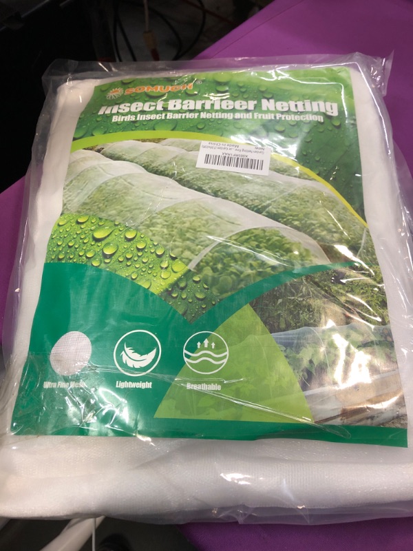 Photo 2 of Netting for Garden Protection-10x33Ft Garden Netting Mesh Plant Covers with Cable Ties(100PCS) Garden Mesh Netting for Vegetable Plants Fruits Flowers Garden Net Barrier Screen Net Cover