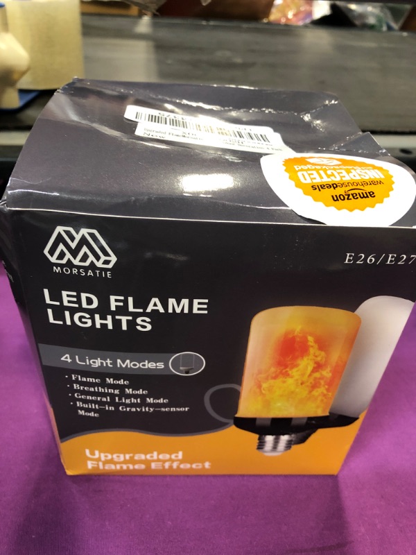 Photo 1 of ?Upgraded Flame?Morsatie LED Flame Light Bulbs, 4 Modes Flickering Light Bulbs with Gravity Sensor, E26 Fire Light Bulb for Halloween, Christmas, Party, Porch, Patio, Indoor Outdoor Decoration-4 Pack 4-black