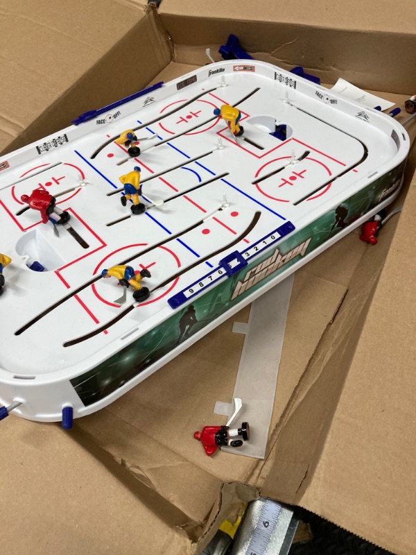 Photo 2 of Franklin Sports Table Top Rod Hockey Game Set - Perfect Hockey Toy + Gameroom Game for Kids + Family - Mini Tabletop Rod Hockey Board + Pucks Included
