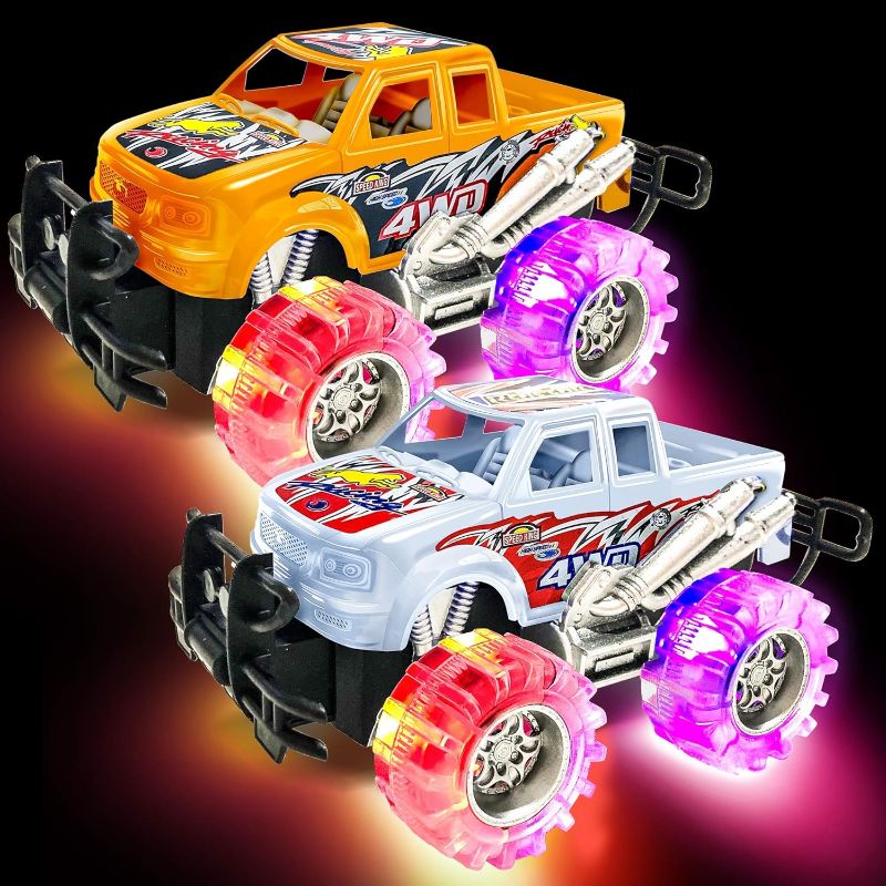 Photo 1 of ArtCreativity Orange and White Light Up Monster Truck Set for Boys and Girls, Set includes 2, 6 Inch Monster Trucks with Beautiful Flashing LED Tires, Push n Go Toy Cars, Best Gift for Kids Ages 3+