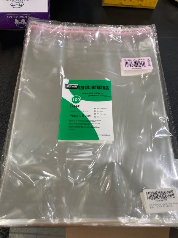 Photo 2 of 100 Pcs 12" x 16" Self Seal Clear Cellophane Bags Resealable Plastic Apparel Bags Perfect for Packaging Clothing, T-Shirt, Brochure, Prints, Handicraft Gift Bags