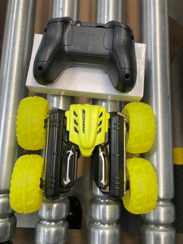 Photo 1 of Remote Control Car for Boys 8-12, 2.4GHz LED Fast RC Stunt Car, 4WD Double Side 360° Rotating RC Truck with Rechargeable Battery yellow