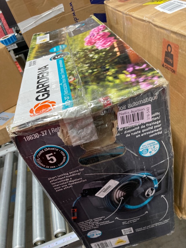 Photo 3 of ***HOSE WILL NOT LOCK IN PLACE*** GARDENA 115' ft. Wall Mounted Retractable Hose Reel, Black and Turquoise Wall-Mounted Hose Reel 115 ft