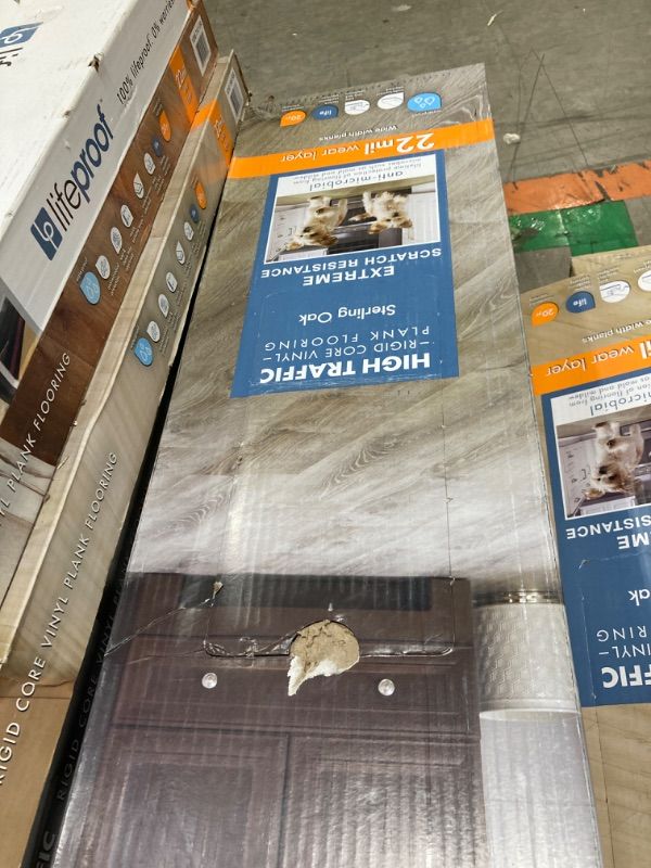 Photo 2 of Lifeproof Sterling Oak 22 MIL x 8.7 in. W x 48 in. L Click Lock Waterproof Luxury Vinyl Plank Flooring (20.1 sqft/case)