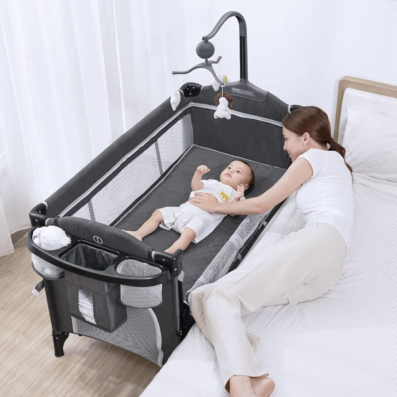 Photo 1 of ANGELBLISS 5 in 1 Flat Bassinet Bedside Sleeper Rocking Bassinet Easy Folding Portable Playards Pack and Play with Mattress Diaper Changer and Music