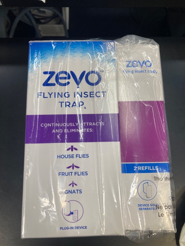 Photo 1 of Zevo Flying Insect Trap for Indoors: Light Trap Captures Fruit Flies, Gnats and Houseflies, Starter Kit + Refills (1 Plug-in Base + 3 Cartridges) 1 Device & 3 Cartridges