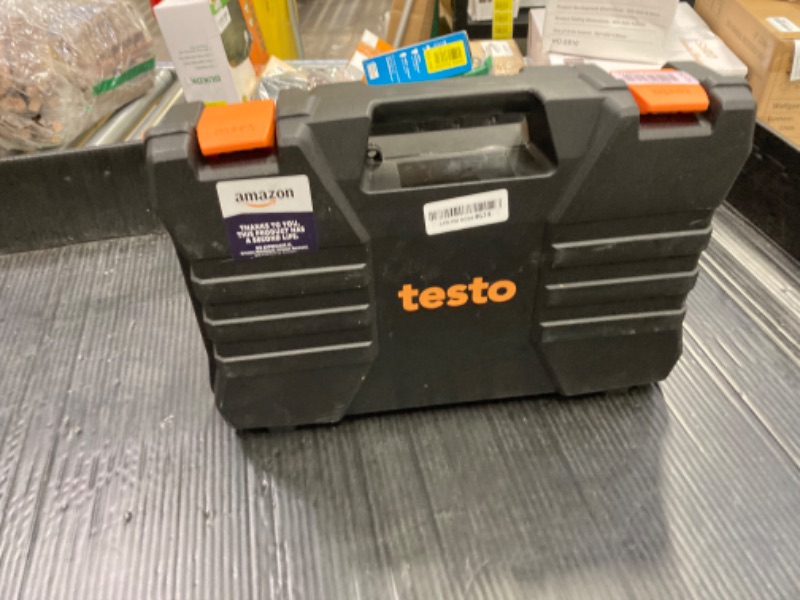 Photo 2 of ***DOES NOT FUNCTION, FOR PARTS*** testo 557s AC Manifold Gauge Set – AC Recharge Kit with 2x testo 115i Pipe Clamp Thermometer, 1x testo 552i Micron Gauge, and 4x Hoses – AC Gauge Set with Bluetooth