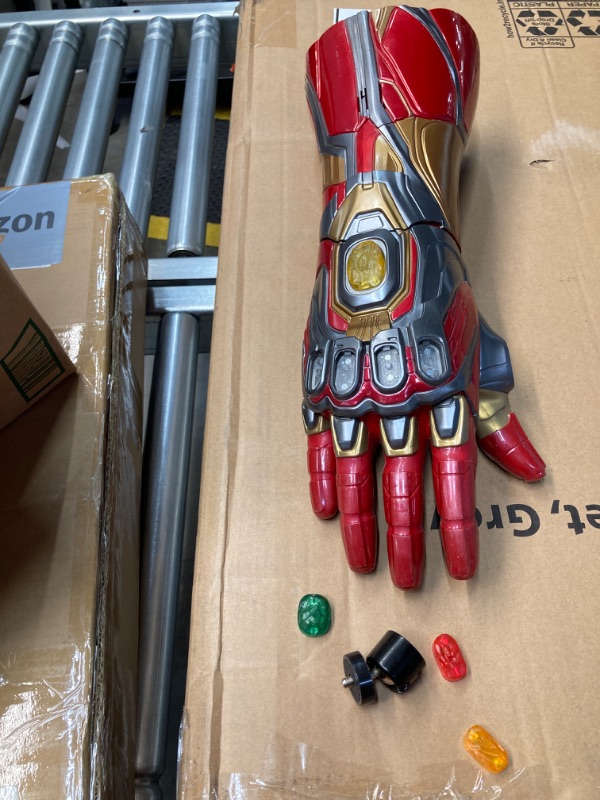 Photo 1 of Avengers Marvel Legends Series Iron Man Nano Gauntlet Articulated Electronic Fist with Lights , Authentic Movie Sounds and Removable Infinity Stones