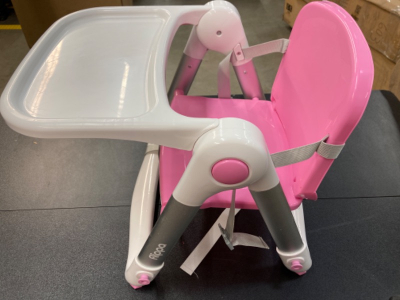 Photo 2 of FLIPPA Baby Booster Seat for Dining Table, Folding Portable Booster Chair for Toddlers Eating with Tray and Seat Belt Pink  **NEEDS CLEANING BEFORE USE**