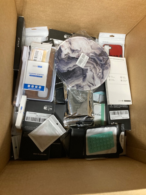 Photo 1 of MIXED PHONE CASES AND MISC BOX