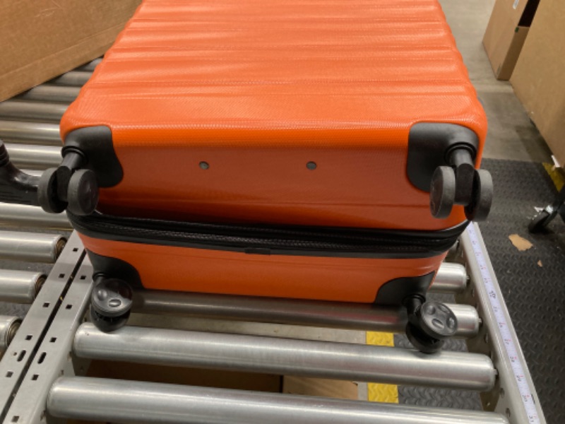 Photo 1 of ***Minor Damage*** Amazon Basics 30-Inch Hardside Spinner, Orange Orange 30-inch Spinner
