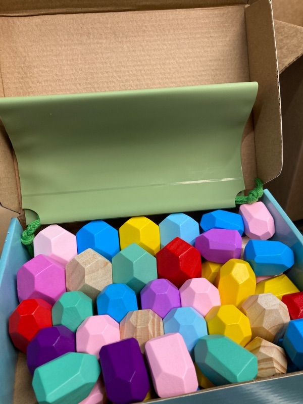 Photo 1 of IGIVI Montessori Toys for 1 2 3 Year Old Boys & Girls, Wooden Stacking Sorting Rocks Balancing Stone, Preschool Educational Sensory Toys for Toddlers, Birthday Gifts for Kids Toys Ages 2-4 5-7