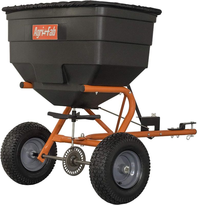 Photo 1 of 185 lbs. Capacity Tow Broadcast Spreader