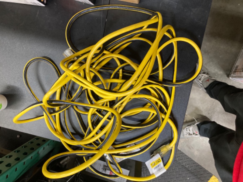 Photo 2 of Husky VividFlex 50 ft. 12/3 Heavy Duty Indoor/Outdoor Extension Cord with Lighted End, Yellow