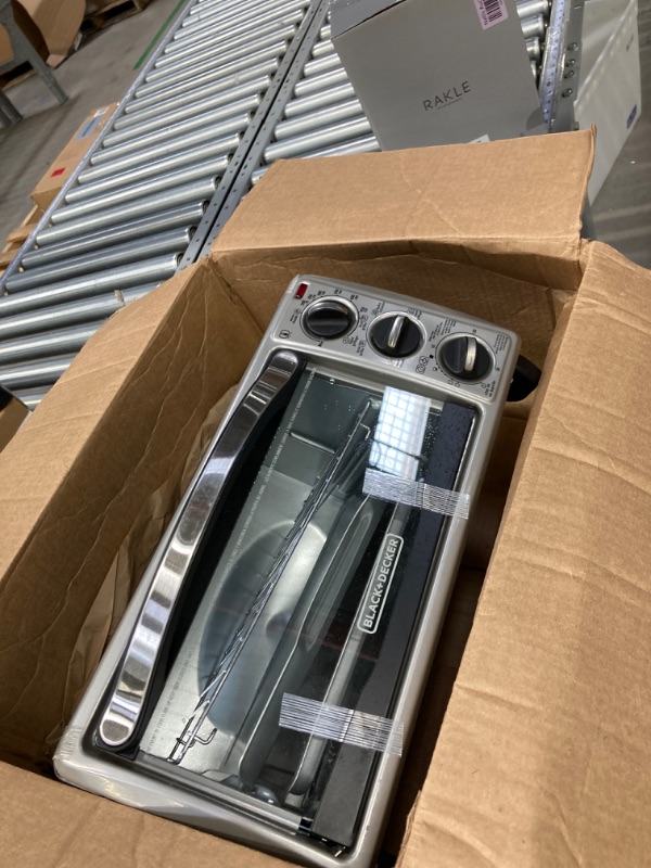 Photo 2 of BLACK+DECKER 4-Slice Toaster Oven, TO1313SBD, Even Toast, 4 Cooking Functions Bake, Broil, Toast and Keep Warm, Removable Crumb Tray, Timer