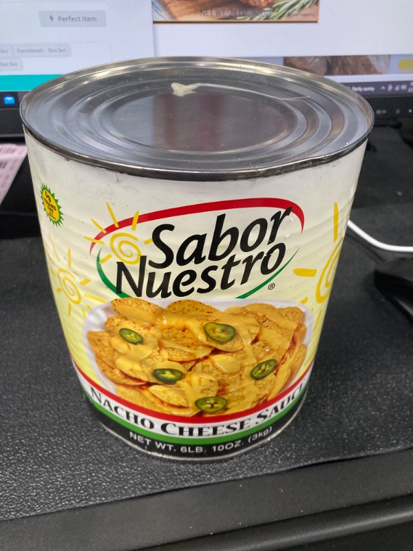 Photo 2 of ***HAS A DENT*****best use 03/may/2024*****  Sabor Nuestro Nacho Cheese Sauce 6 lb.10 oz.