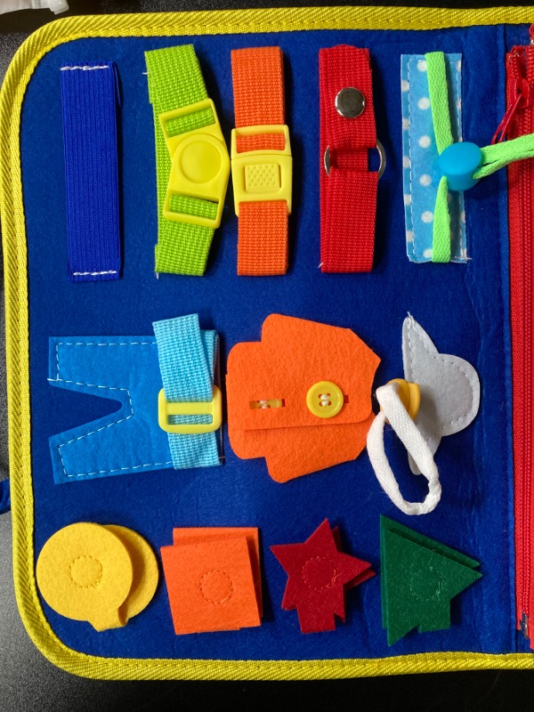 Photo 5 of HONGDDY Busy Board, 12 in 1 Toddler Toys with Peekaboo Books Sensory Toys for Autism Montessori Toys Gifts for 1 2 3 Year Old Boys Girls Learning Fine Motor Skills Travel Toys for Plane Car Giraffe & Clocks - Blue