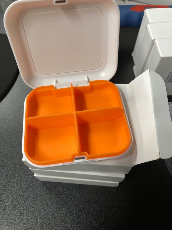 Photo 2 of Pill Box Portable Pill Dispensing Box, Travel Portable Pill Box, 4-Compartment Daily Portable Pill Organizer, Suitable for Vitamins, Medicines, Fish Oil (White+Orange) 3 PACK