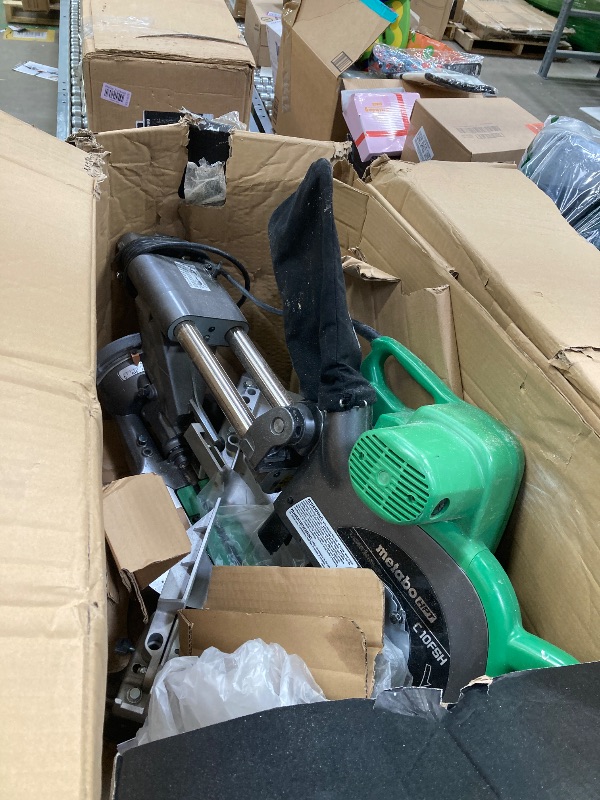 Photo 2 of ***DOES NOT RUN/PARTS ONLY***Metabo HPT 10-Inch Sliding Compound Miter Saw, Double-Bevel, Electronic Speed Control, 12 Amp Motor, Electric Brake, 5-Year Warranty (C10FSBS)
