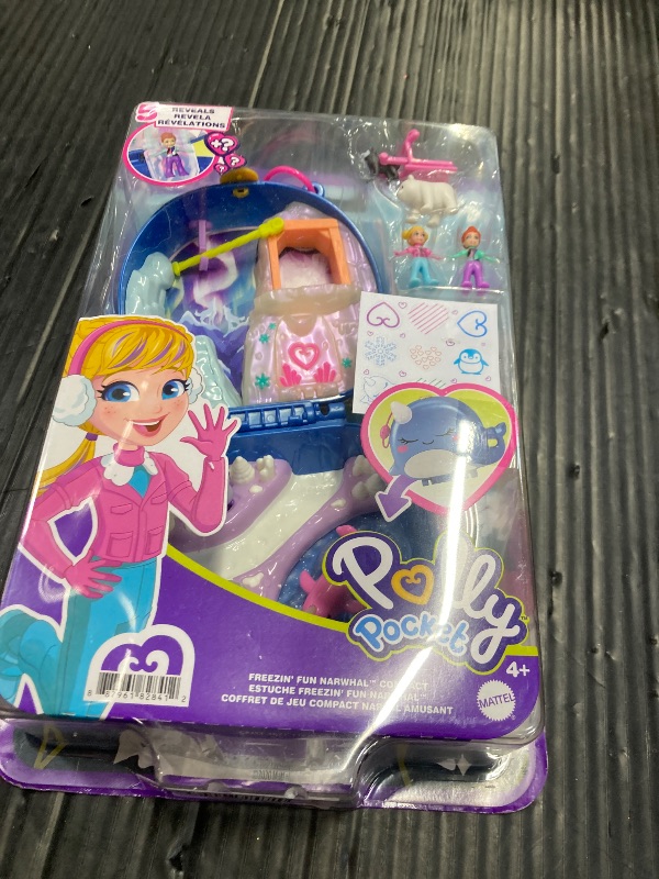 Photo 2 of ?polly Pocket Freezin' Fun Narwhal Compact with Fun Reveals, Micro Polly and Lila Dolls, Husky Dog and Sled, Polar Bear Figure and Sticker Sheet; for Ages 4 Years Old and Up