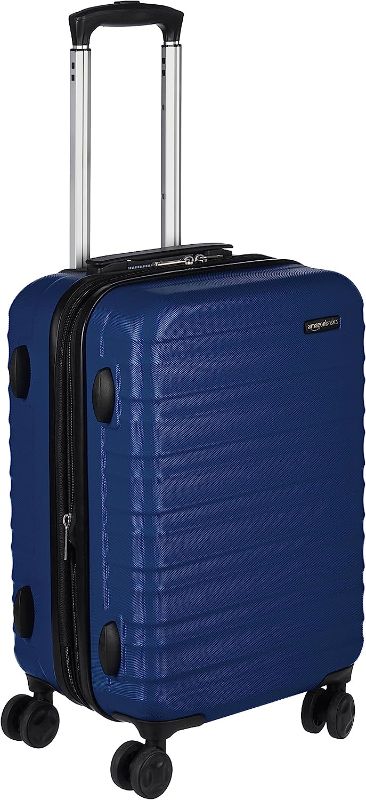 Photo 1 of Amazon Basics Expandable Hardside Carry-On Luggage, 20-Inch Spinner with Four Spinner Wheels and Scratch-Resistant Surface, Navy Blue
