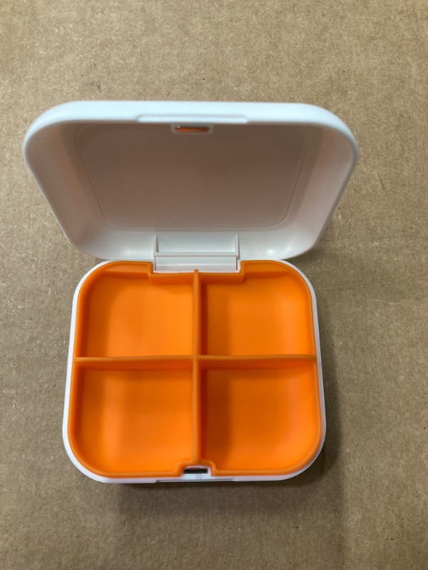 Photo 2 of Pill Box Portable Pill Dispensing Box, Travel Portable Pill Box, 4-Compartment Daily Portable Pill Organizer, Suitable for Vitamins, Medicines, Fish Oil (White+Orange) 2P{ack