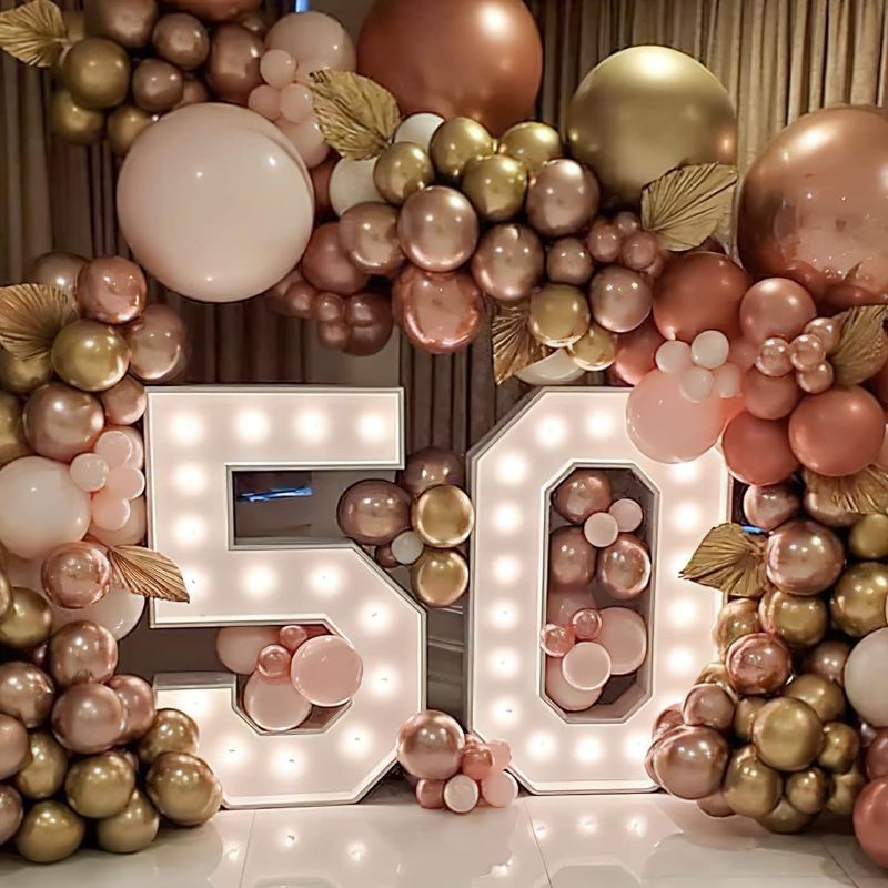Photo 1 of 
 4 package PartyWoo Rose Gold Balloon Garland, 154  pcs Balloons Different Sizes Pack of 18 Inch 12 Inch 10 Inch 5 Inch Rose Gold Champagne Gold Bronze Silver Balloons...