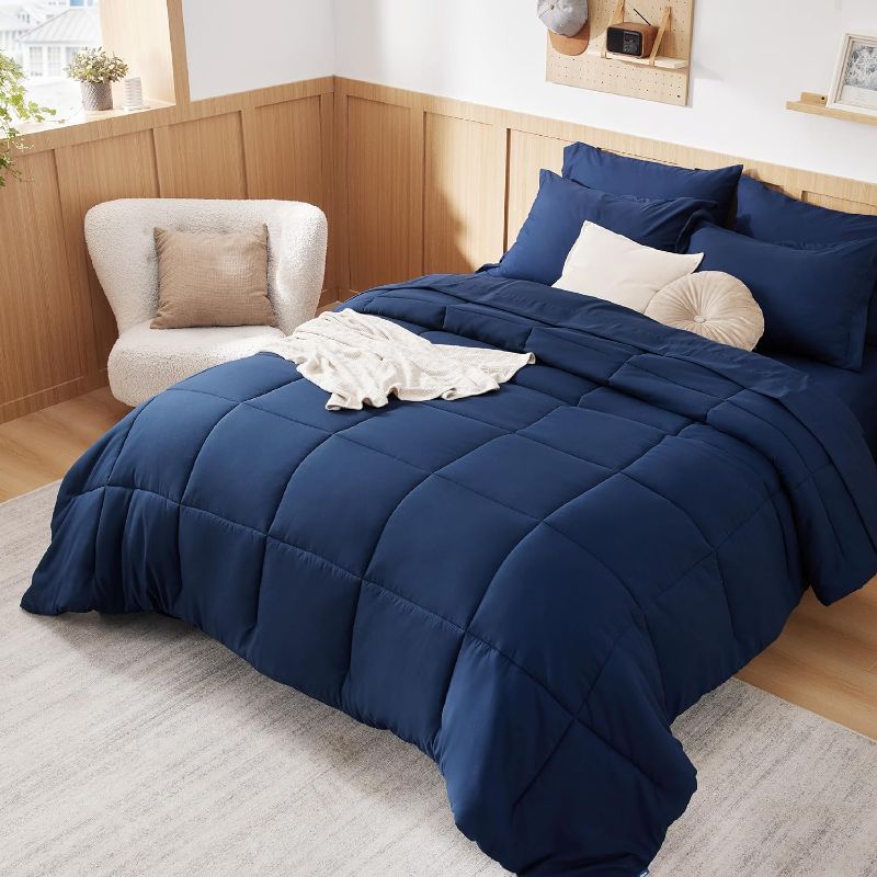 Photo 1 of Bedsure Navy Bedding Sets Queen - 7 Pieces Solid Queen Bed in a Bag, Queen Bed Set Navy with Quilted Warm Fluffy Comforters, Sheets, Pillowcases & Shams
