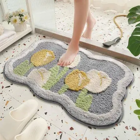 Photo 1 of Simplicity Flower Bathroom Mat Non Slip Bath Rug Extra Absorbent and Soft Microfiber Bath Carpet Machine Washable Bath Rug for The Entrance of The Door, Bathroom and Bedroom (24"x16",Yellow)