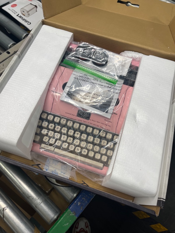 Photo 3 of Royal 79105Y Classic Manual Typewriter (Pink)
***In Factory Packaging***