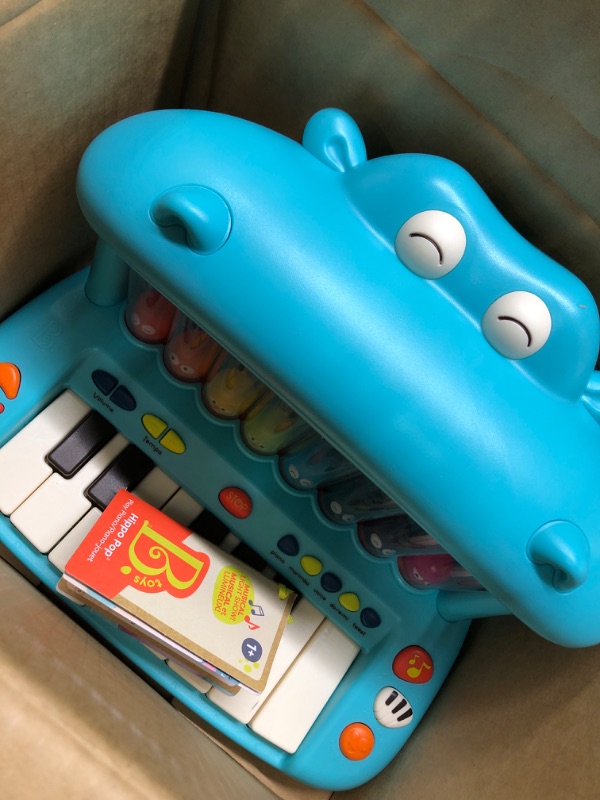 Photo 3 of B. toys- Hippo Pop- Musical Toy Keyboard – Play Piano – Songs, Sounds & Lights – Musical Instrument for Toddlers, Kids – 12 Months +