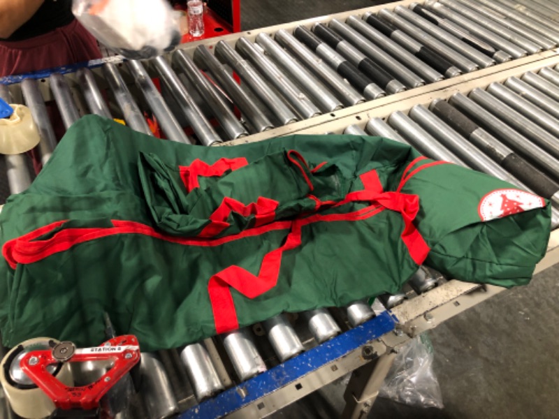 Photo 1 of Primode Rolling Tree Storage Bag, Fits Up to 9 ft. Disassembled Holiday Tree, 28" Height X 16" Wide X 60" Long, Extra Large Heavy Duty Storage Container with Wheels and Handles (Gray)