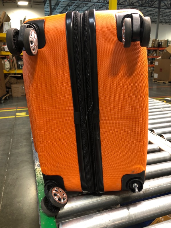 Photo 2 of Rockland Melbourne Hardside Expandable Spinner Wheel Luggage, Orange, Checked-Large 28-Inch Checked-Large 28-Inch Orange*****MISSING WHEEL, SCUFFS.